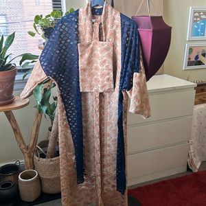 Carmel peach and navy blue outerwear with same fabric belt in good condition